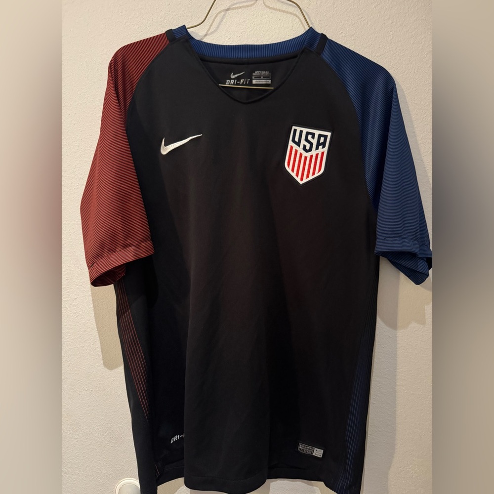 Nike Black Soccer Jersey with Red and Blue Sleeves